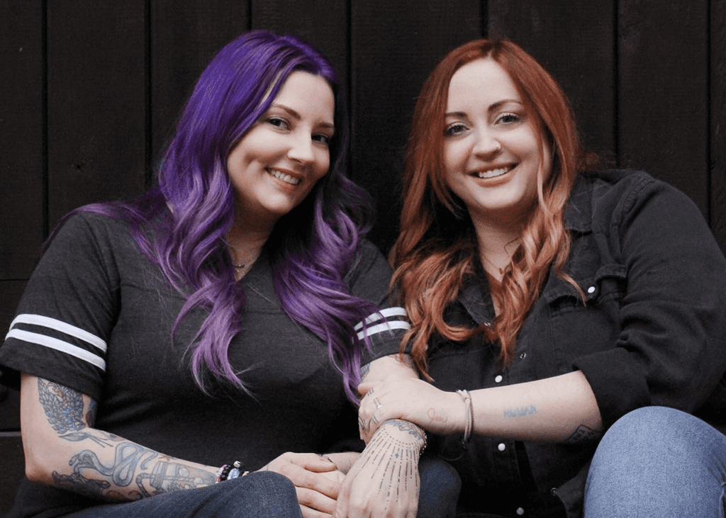 Madison poses for a photograph with her partner