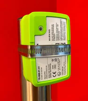 Example of a NEON Temperature Sensor mounted with a band clamp