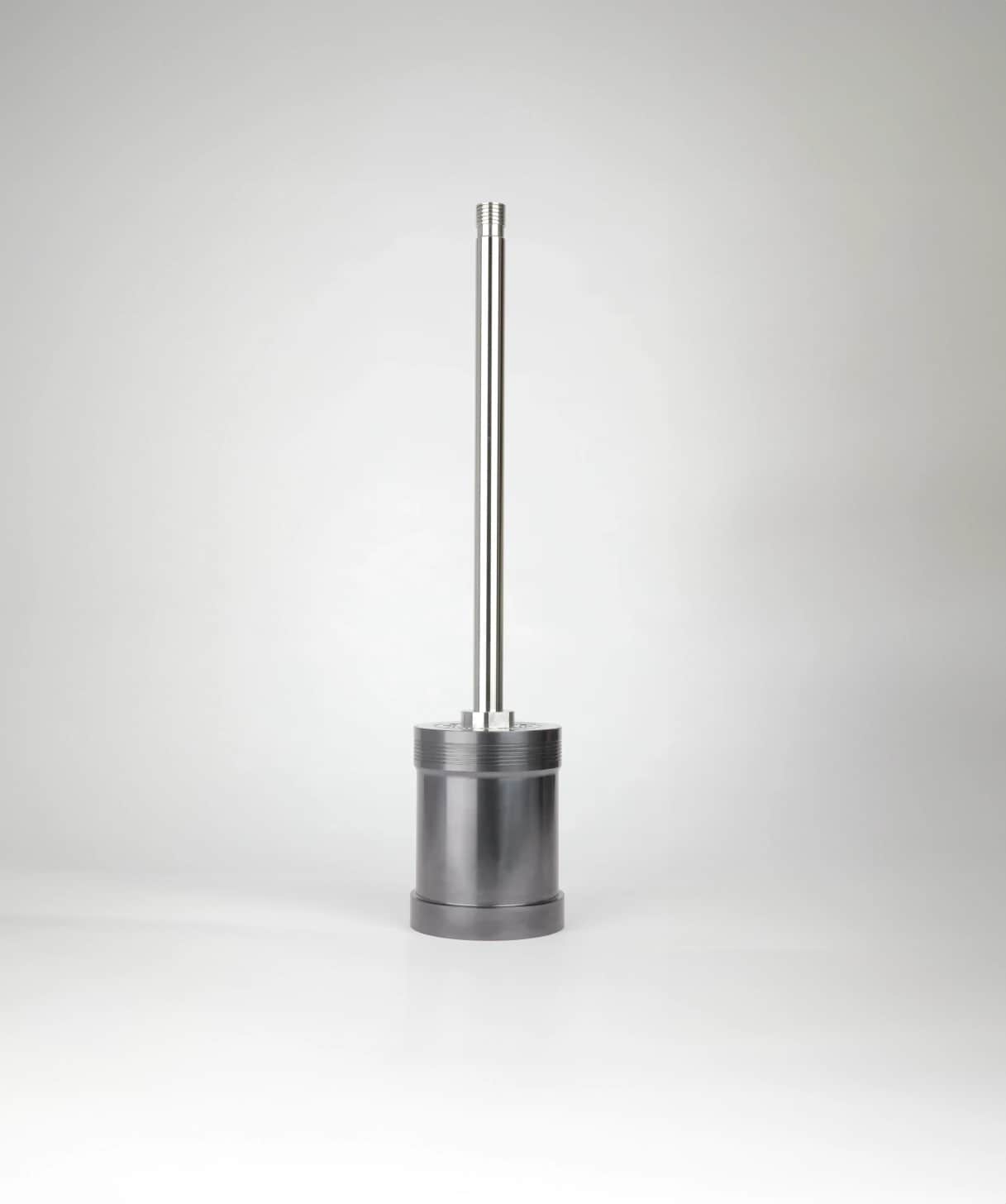 Erosolve cylindrical metallic component with vertical rod, used in power plant applications.