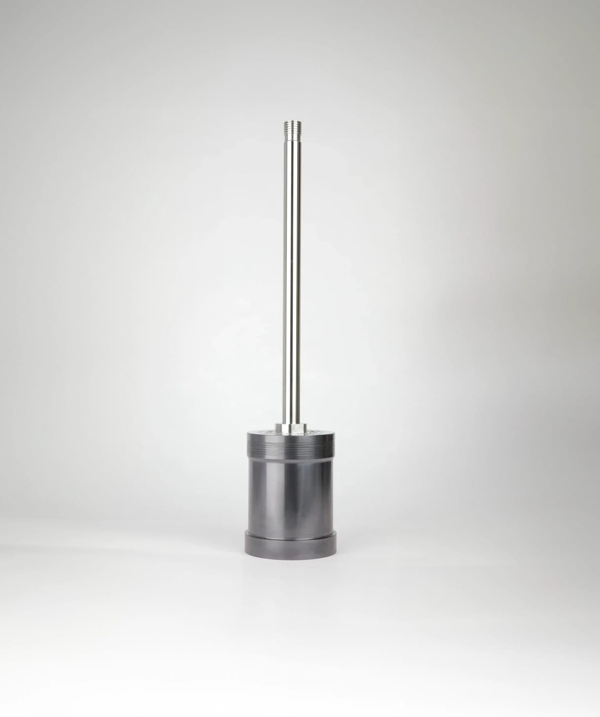 Erosolve cylindrical metallic component with vertical rod, used in power plant applications.