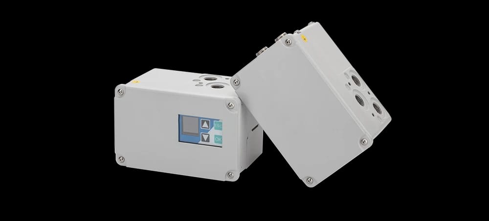 Two grey SHP Positioners with control interfaces, one upright and one angled, used in industrial automation.