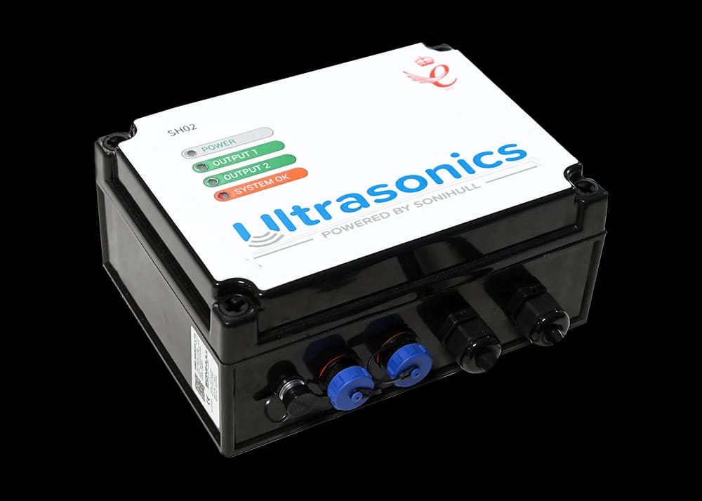 Ultrasonic antifouling device with white top panel, indicator lights, and multiple connectors.